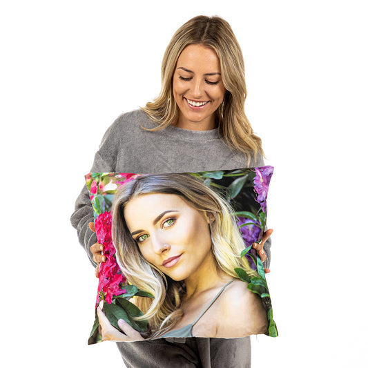 Lady holding personalised cushion with her photo on it