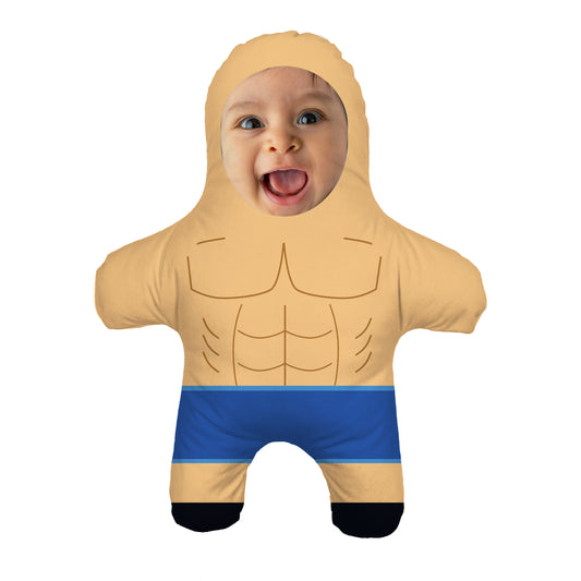 Mini Doll Bodybuilder. Abs and Blue Shorts. Babys Smiling Face. Front View.