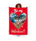 woman holding valentines photo blanket. couple photo and text. heart shaped images.