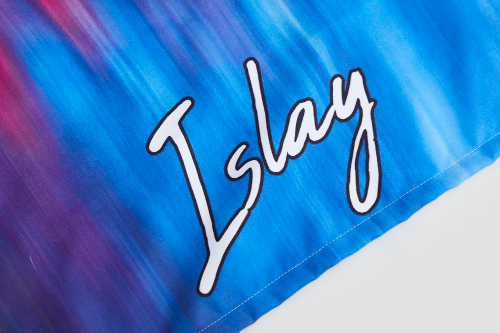 Personalised Sport Towel, Rainbow Magic. Closeup of Text and Texture.