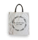 personalised tote bag with circle pattern and text in centre. black handles.