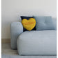 cream heart cushion on sofa with cushions