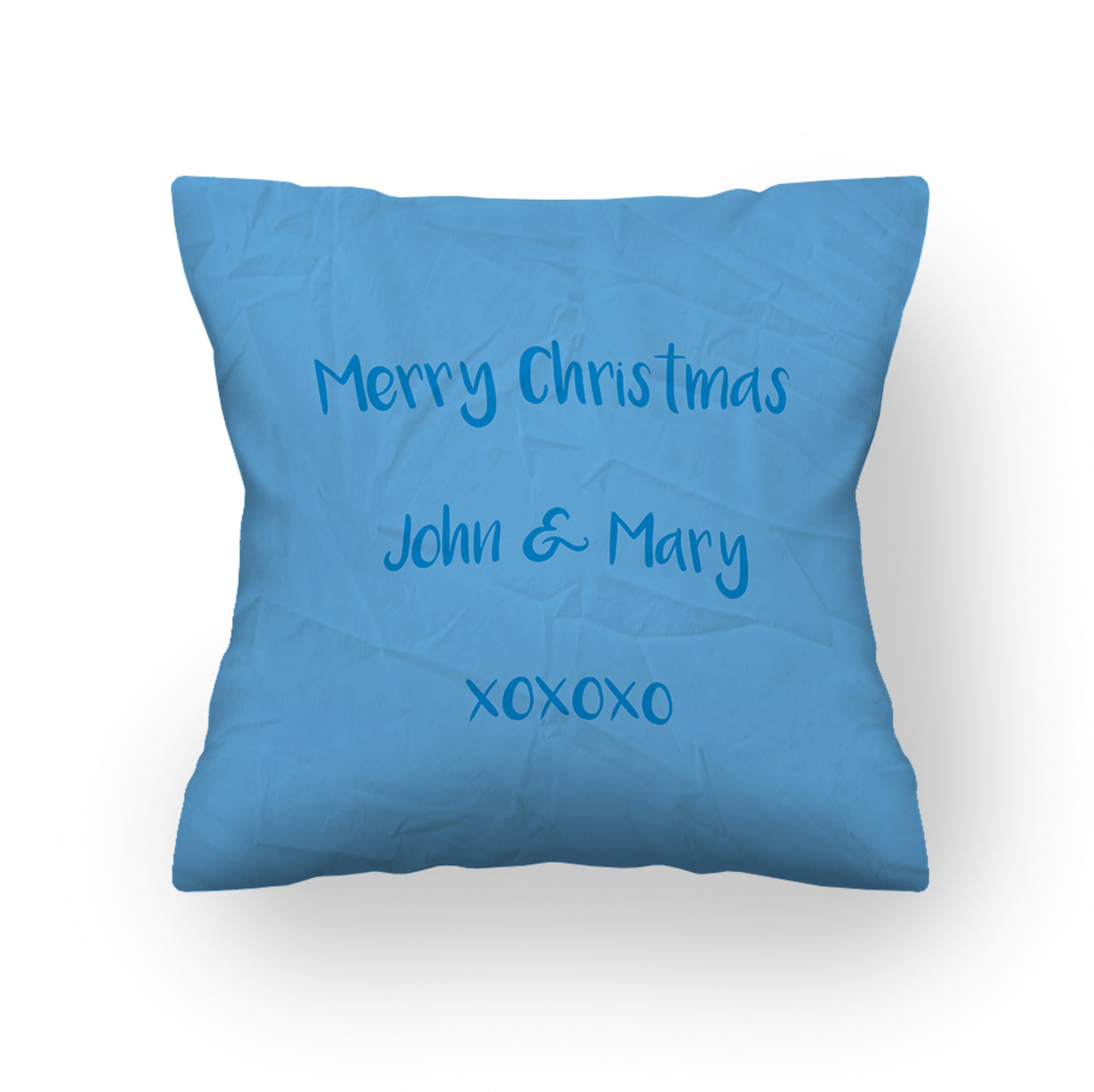 Back of Christmas Cushion. Blue Background. Merry Christmas 'John & Mary xoxoxo'.